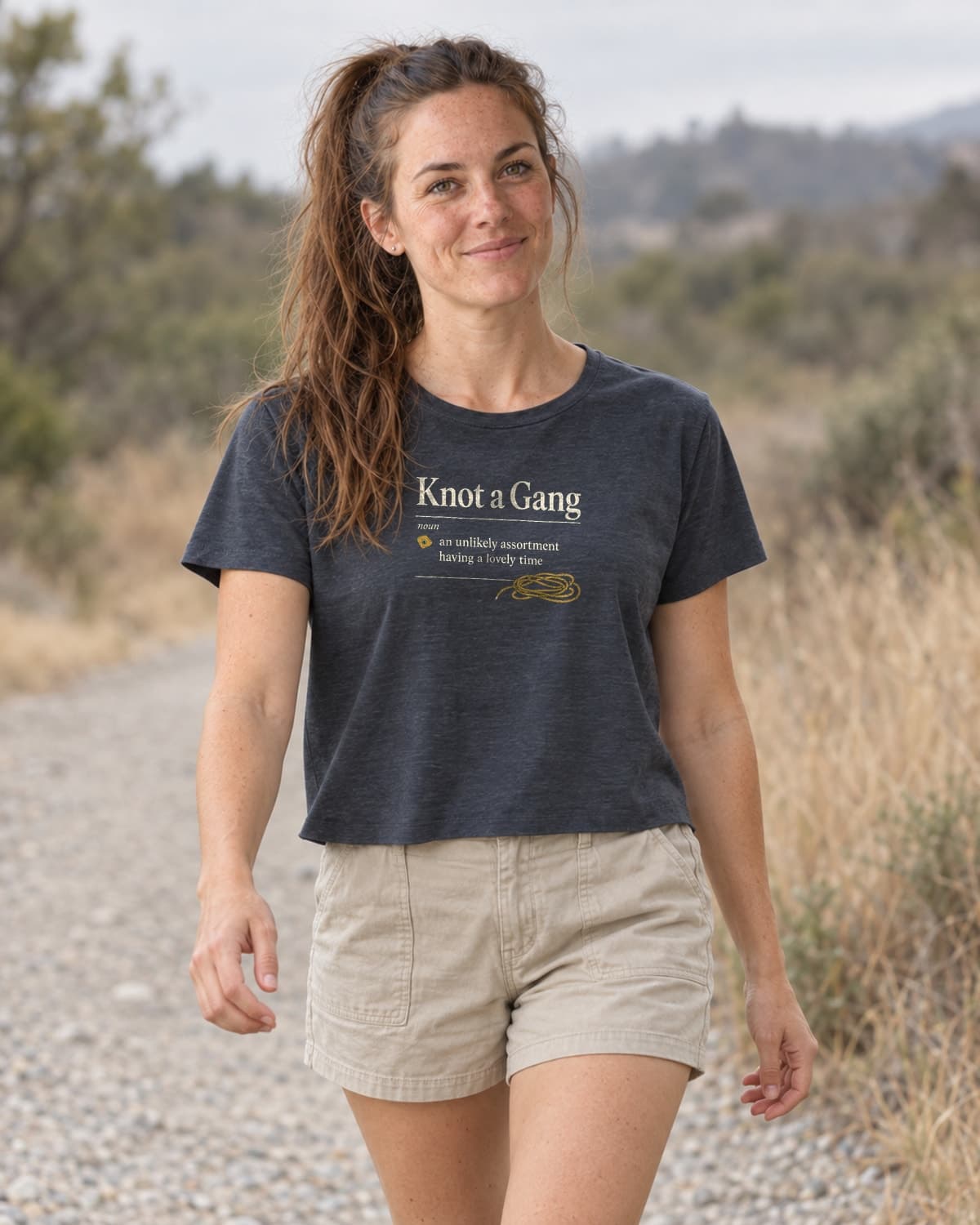 A woman wearing the Antique Denim A Collective Noun crop top in a relaxed lifestyle setting.