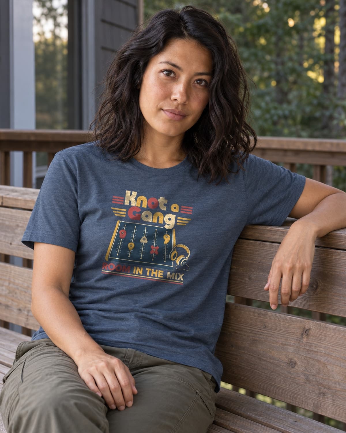 A woman wearing the Indigo Room In The Mix T-shirt in a relaxed lifestyle setting.