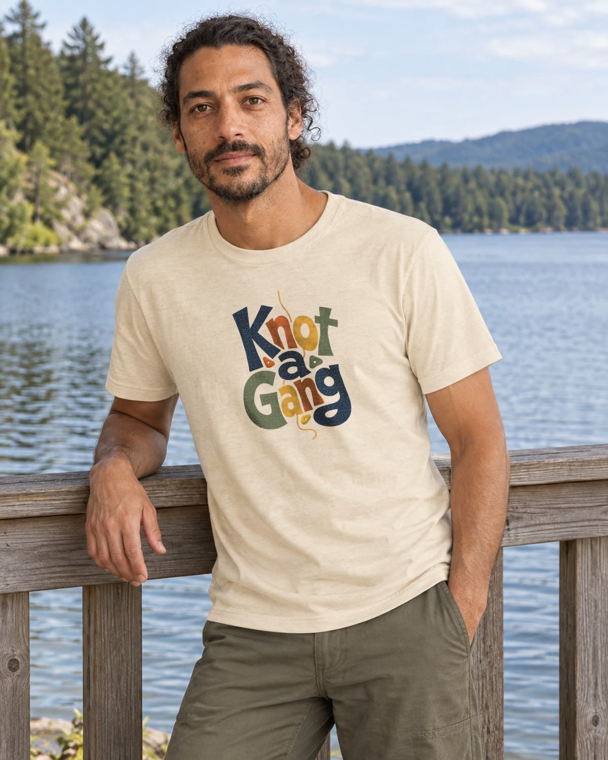 A man wearing the Cream Type Can Lean T-shirt in a relaxed lifestyle setting.