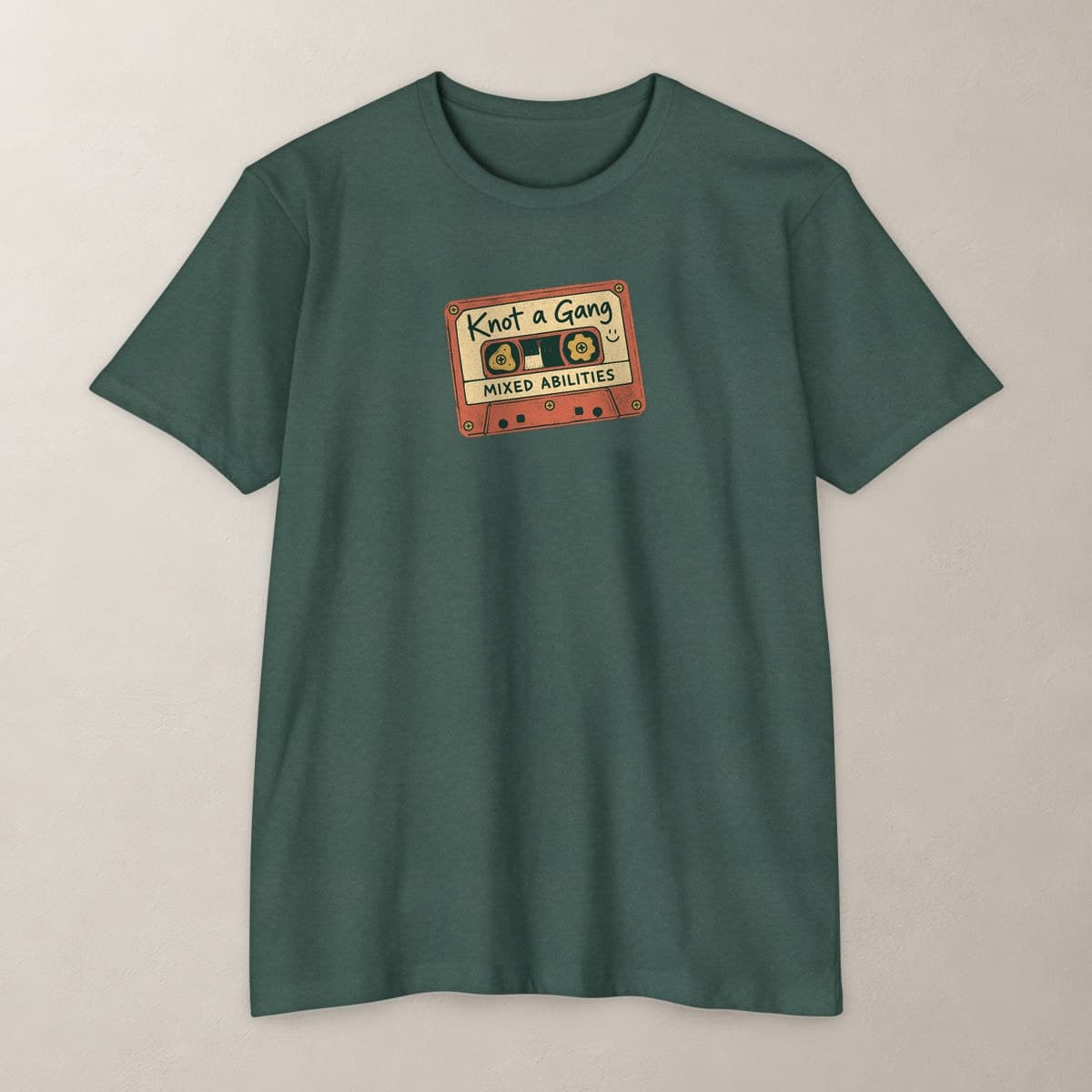 Front view of the Heather Forest Green Mixed Abilities Mixtape T-shirt.