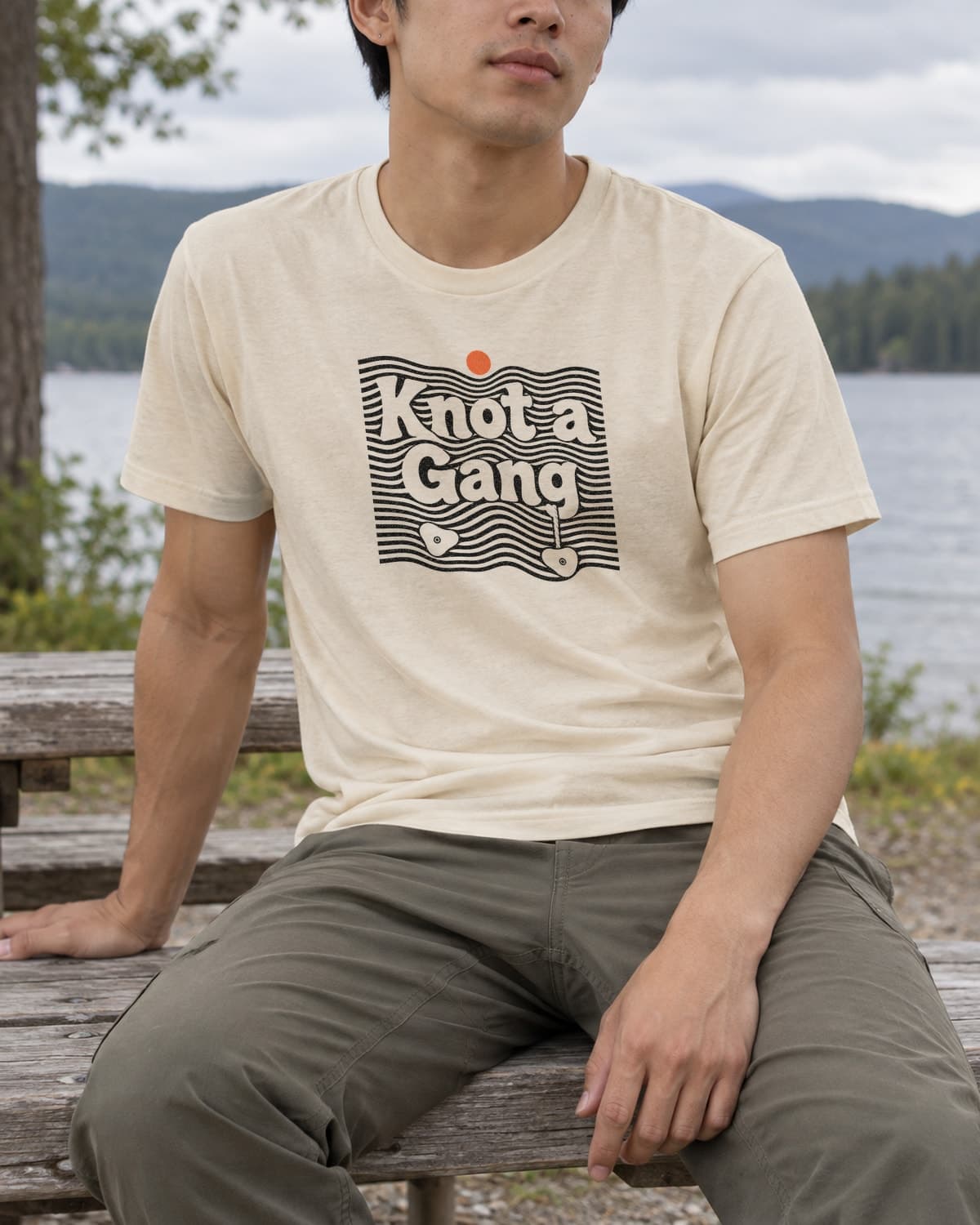 A man wearing the Cream Double Take T-shirt in a relaxed lifestyle setting.
