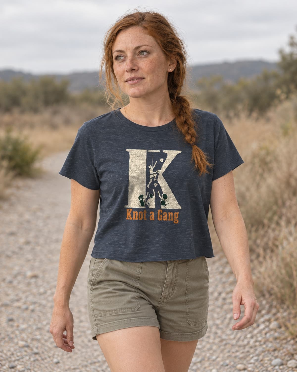 A woman wearing the Antique Denim The Big K crop top in a relaxed lifestyle setting.